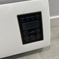 Customer photo of the unit installed above a bed